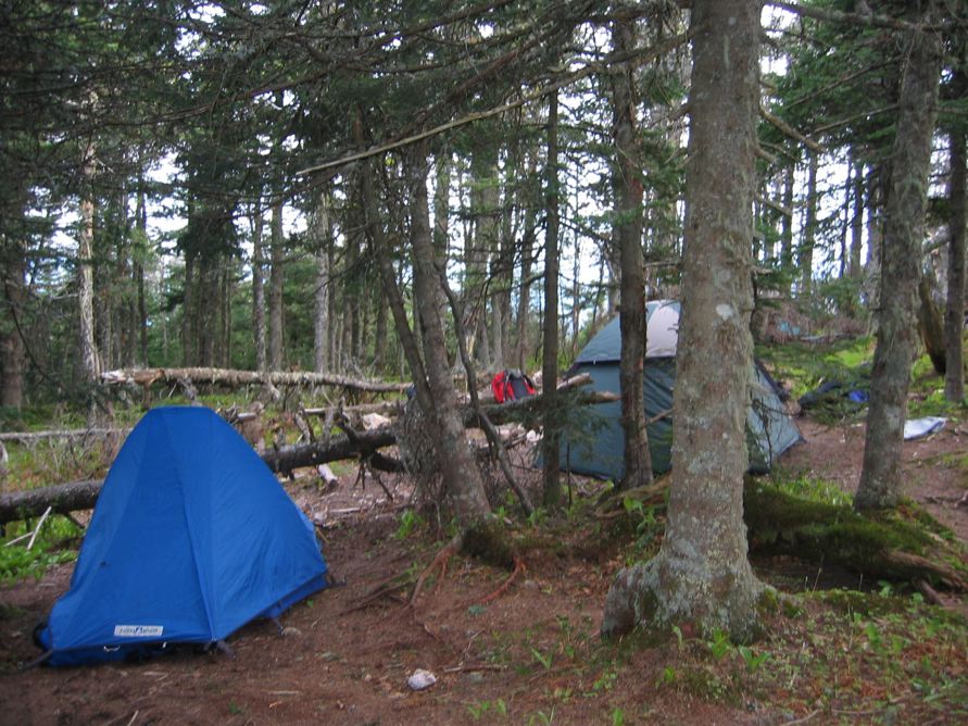 Johnny’s tent sits, while my tent lurks