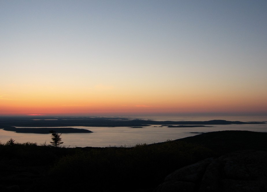 First sliver of the sunrise at Cadillac Mountain